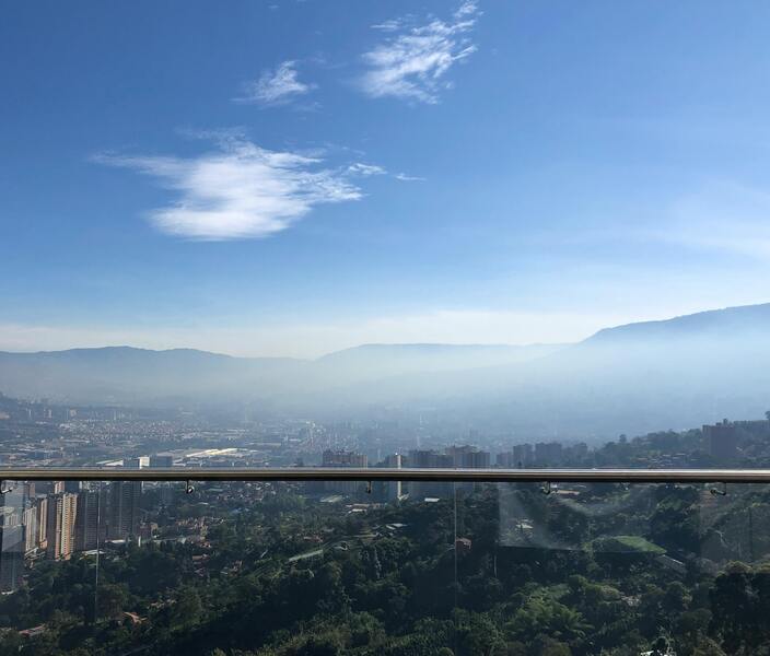 Panoramic view of Medellín valley with modern buildings and mountains