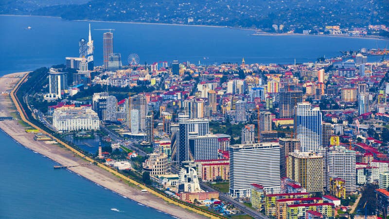 Aerial view of modern Batumi skyline with Black Sea and mountains