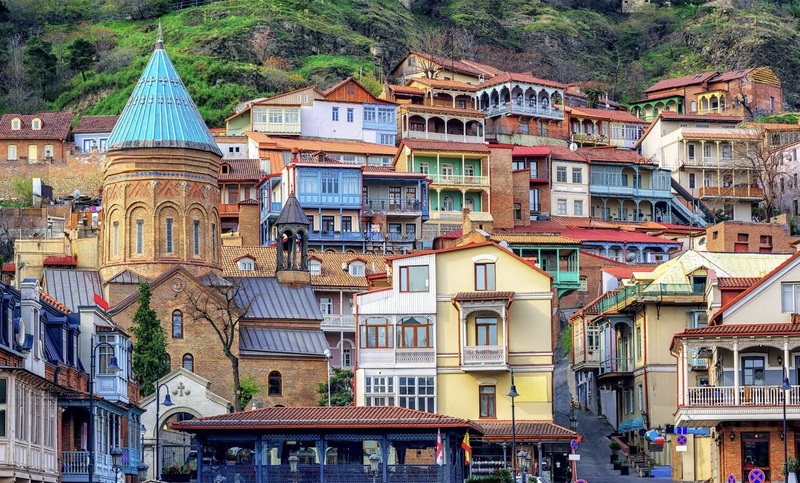 Street view of old Tbilisi with traditional balconies