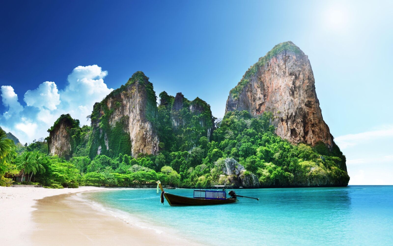 Beautiful Thailand beach with turquoise water and boats