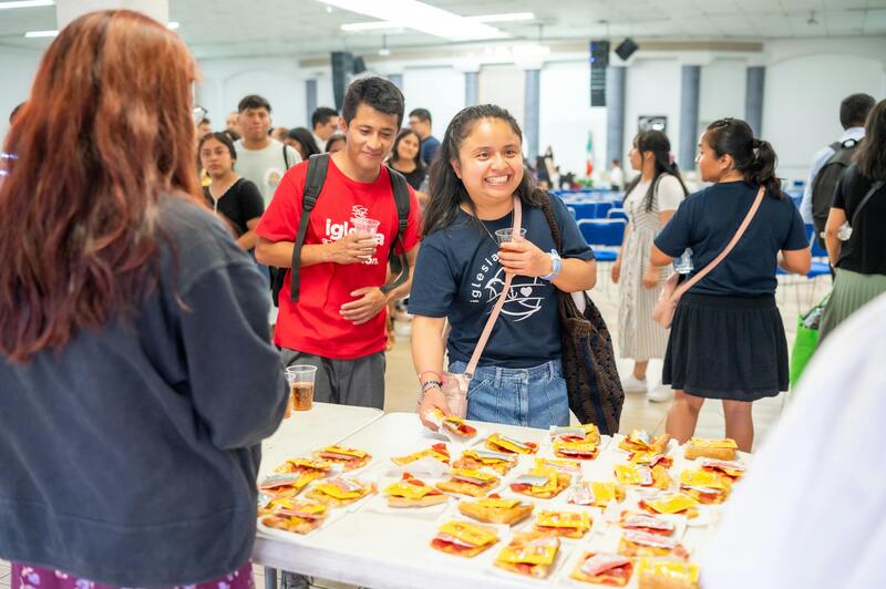 Expat meeting local Thai people at a community event